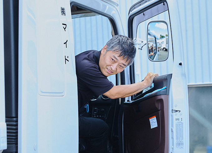 運送